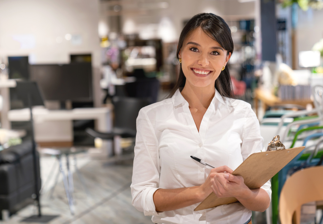 Saleswoman working at a furniture store